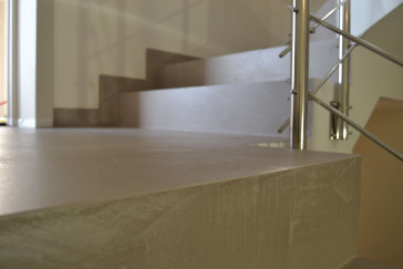 Ecobeton Microbond microcement stair overlayed