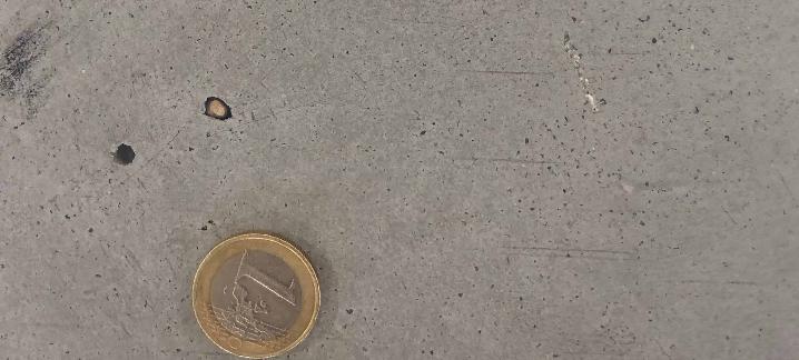 Pinholes on concrete floor