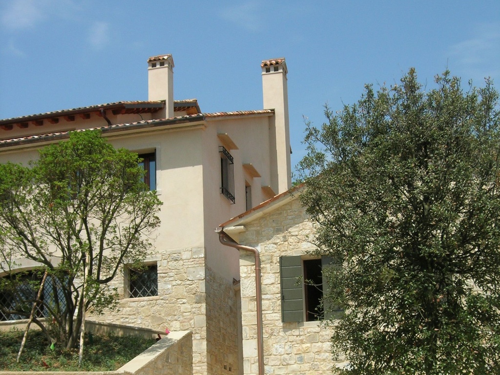 Natural stone villa wall protected with Brickcover