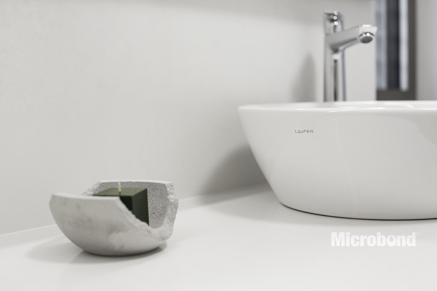 The under-sink countertop is decorated with Microbond