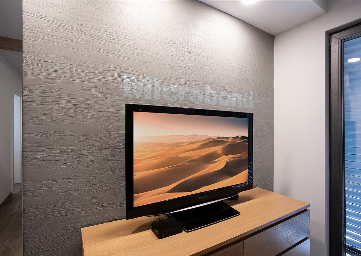 Bedroom wall overlayed with Microbond with a textured effect