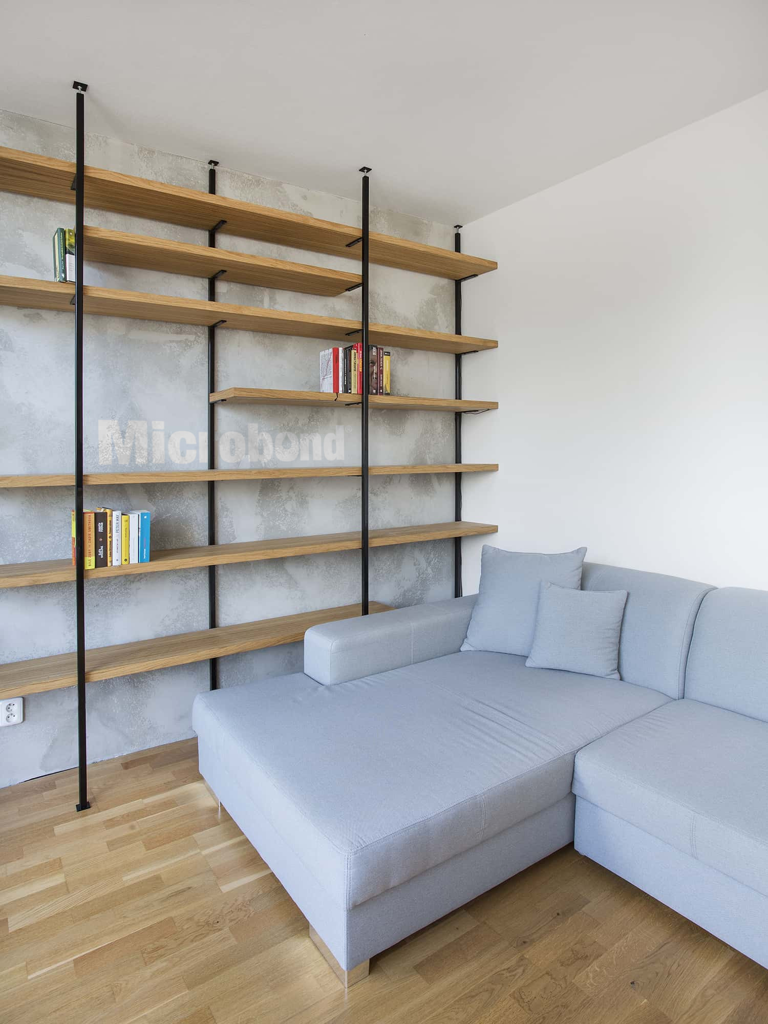 Shaded wall decoration behind the bookcase