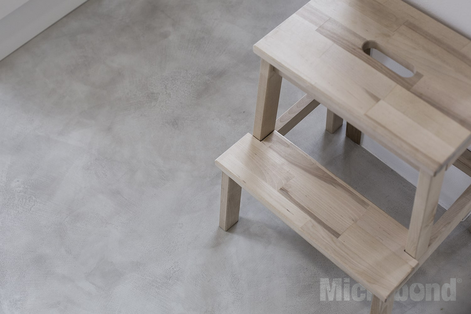 Close-up view of a cloudy microcement floor