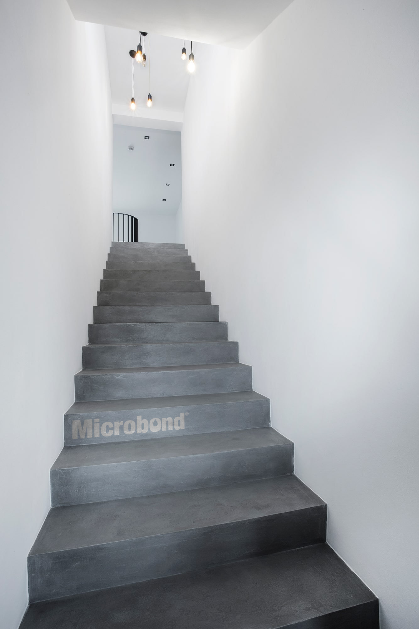 Minimalist staircase made with dark grey Microbond