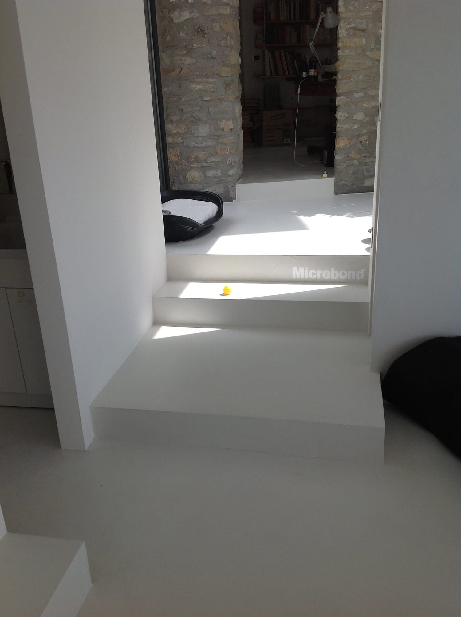 Floor and steps seamlessly covered with white Microbond