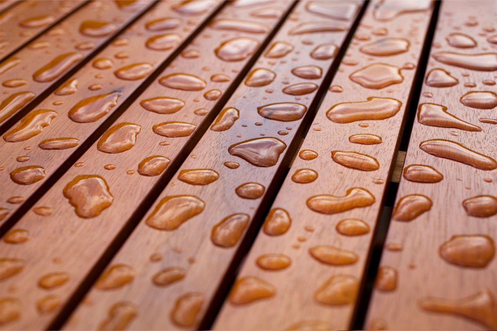 water-repellent effect of water on a wooden deck